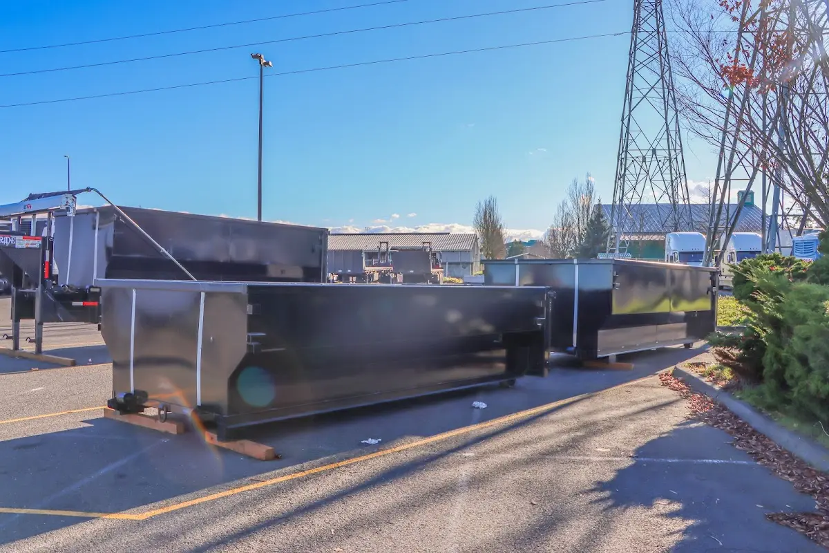 Roll-off dumpster ready for waste disposal at job site for Construction Dumpster Rental in Freeport